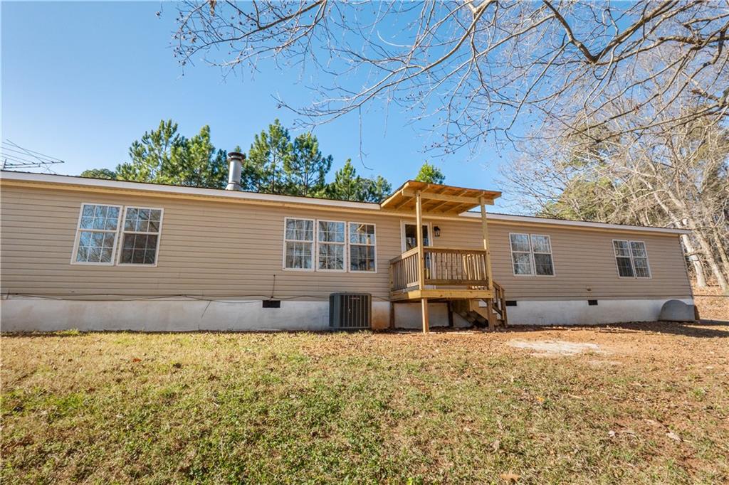 5498 Woodlin Road Lula, GA 30554 - Photo 39 of 40 a front view of a house with a yard