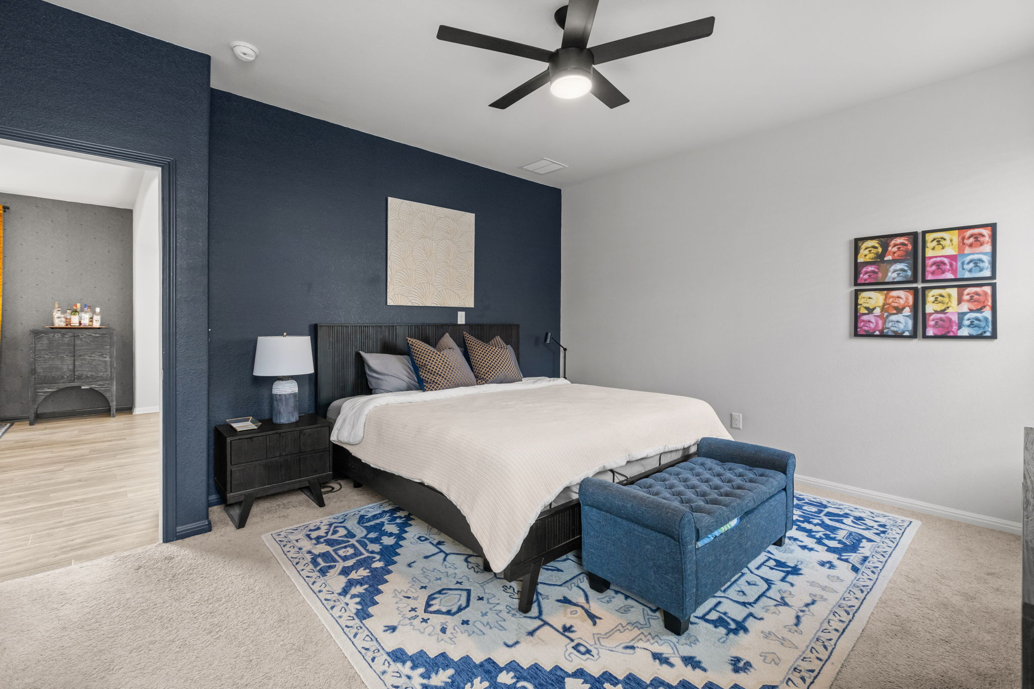 6402 Rafferty Lane Austin, TX 78747 - Photo 12 of 32 a bedroom with a large bed and a window