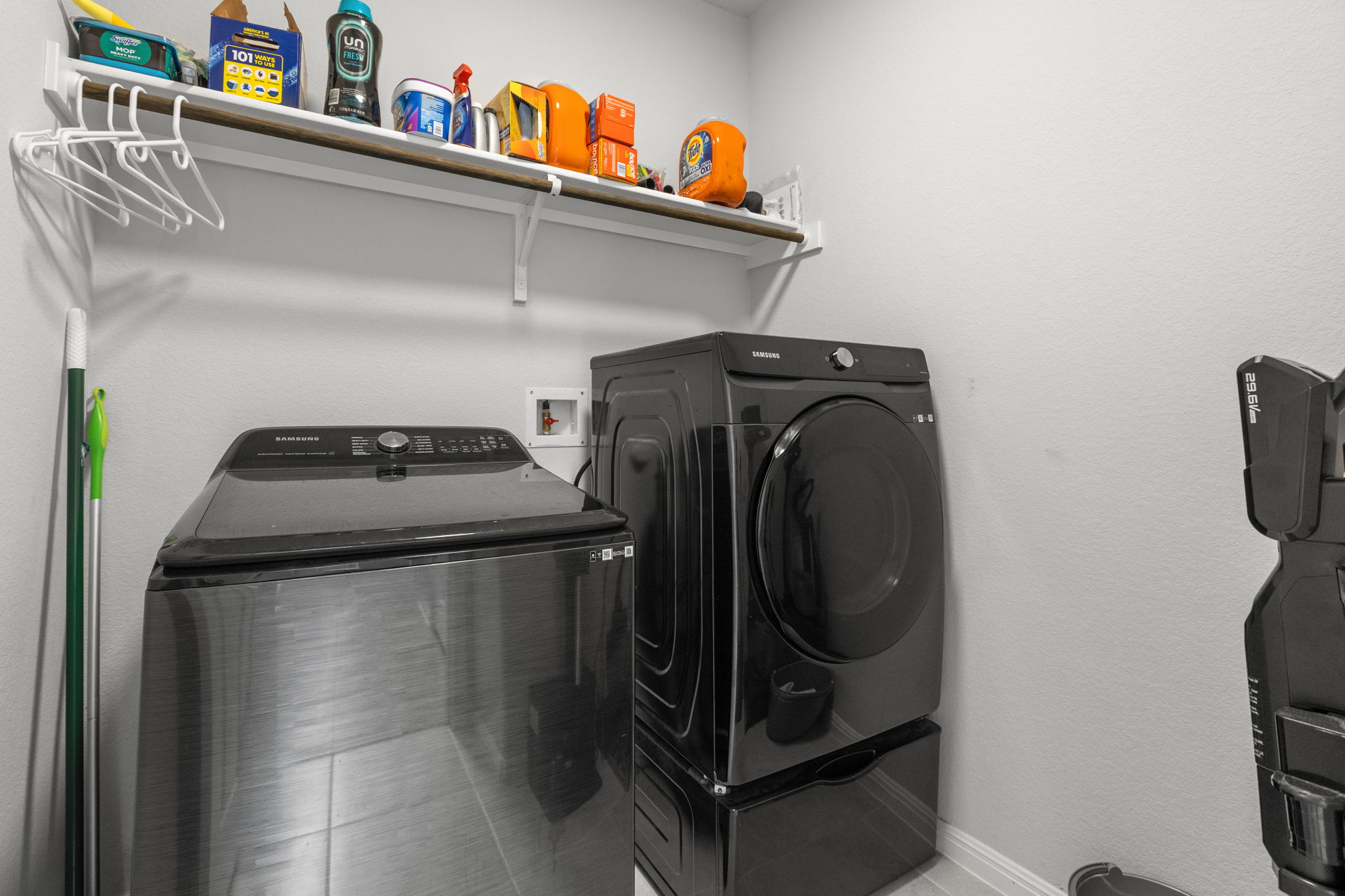 6402 Rafferty Lane Austin, TX 78747 - Photo 18 of 32 a utility room with dryer and washer