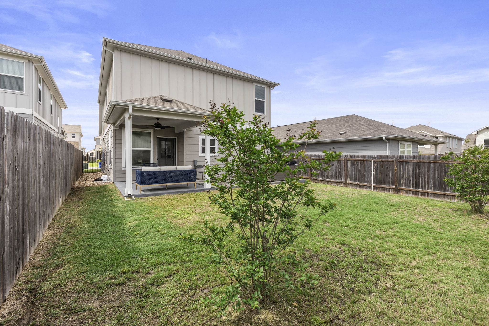 6402 Rafferty Lane Austin, TX 78747 - Photo 29 of 32 a view of a house with backyard and garden