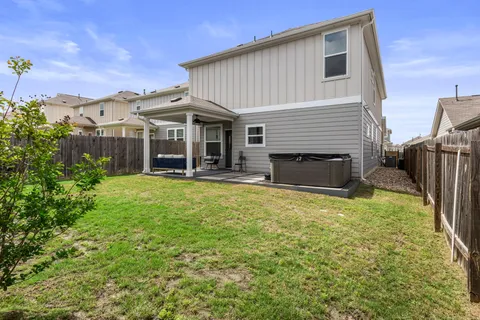 a front view of house with yard and seating area