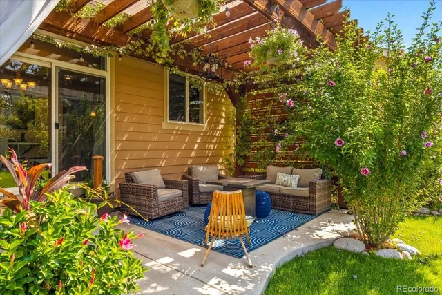 a backyard of a house with seating space