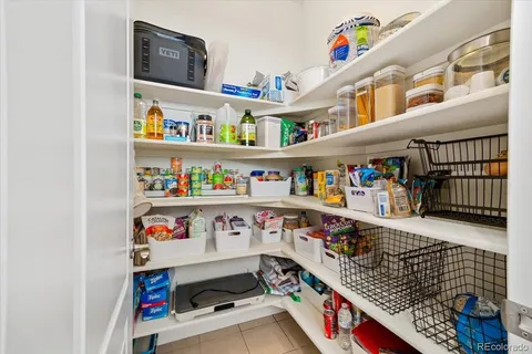 a room with furniture a book shelf and a book shelf