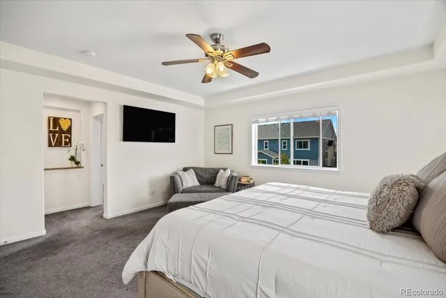 a spacious bathroom with a double vanity sink a mirror and a shower