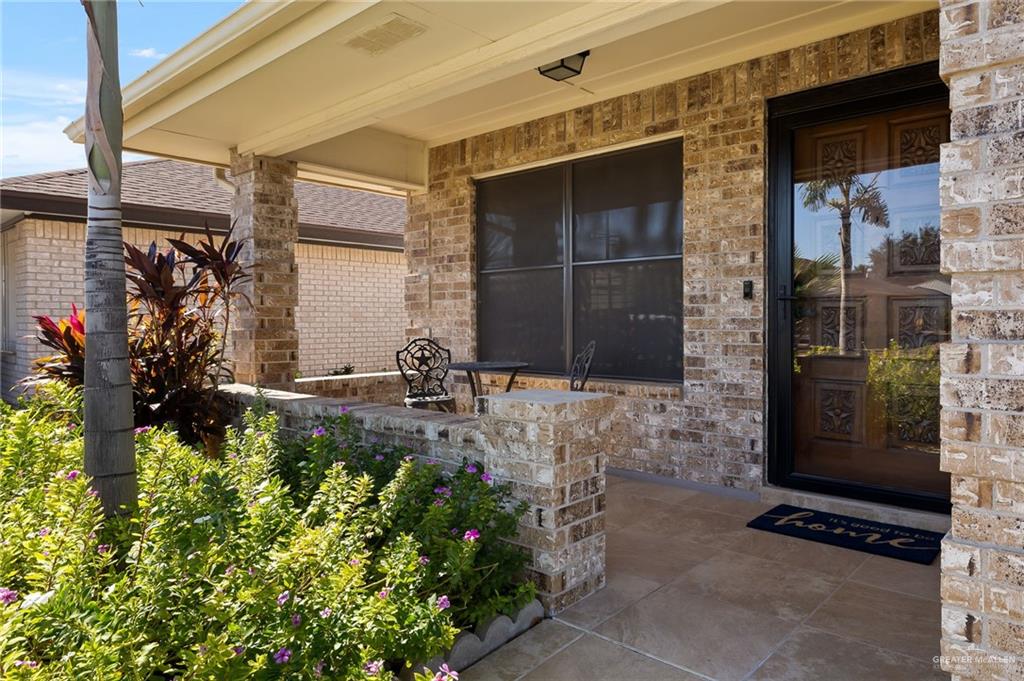 1815 Wilson Street Mission, TX 78572 - Photo 2 of 16 a front view of a house with a yard