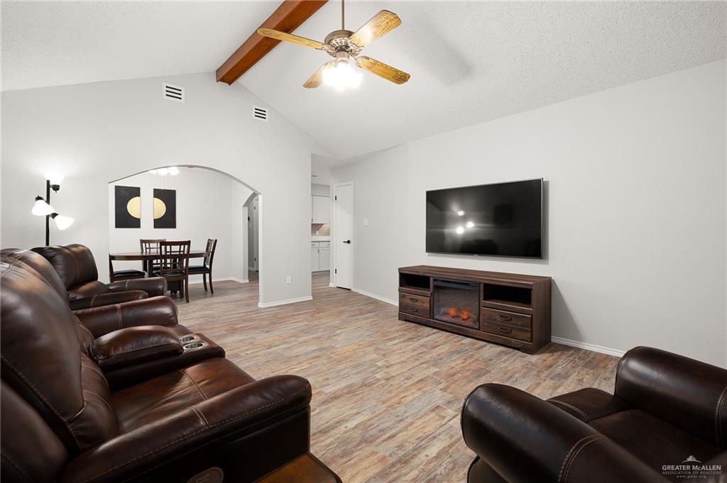 1815 Wilson Street Mission, TX 78572 - Photo 4 of 16 a living room with furniture and a flat screen tv