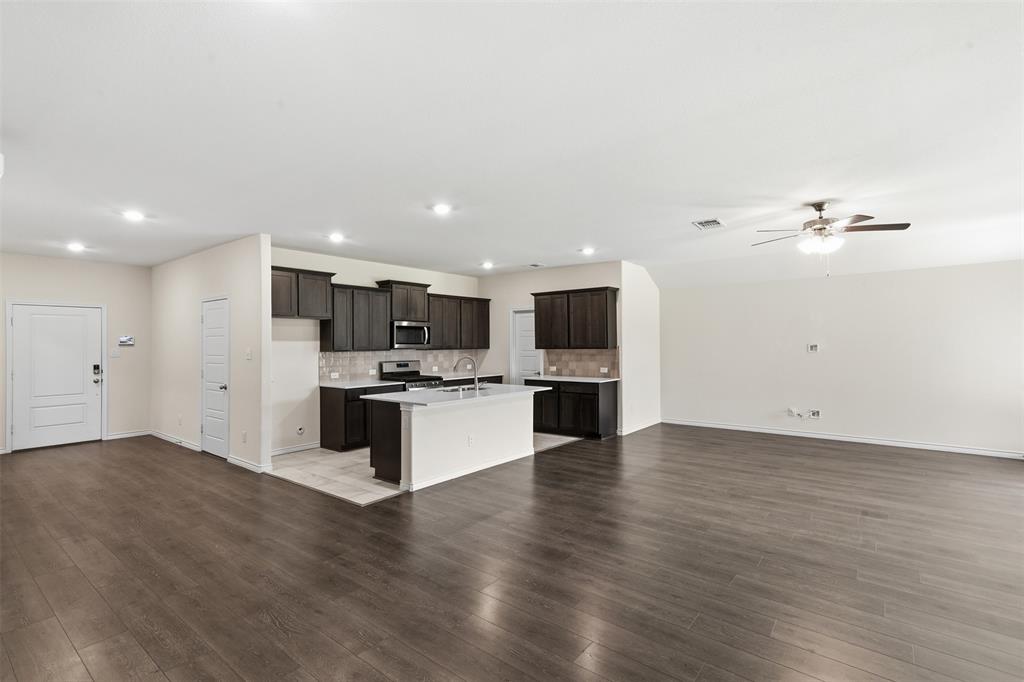 415 Boston Road Fate, TX 75189 - Photo 12 of 40 Living towards kitchen and dining