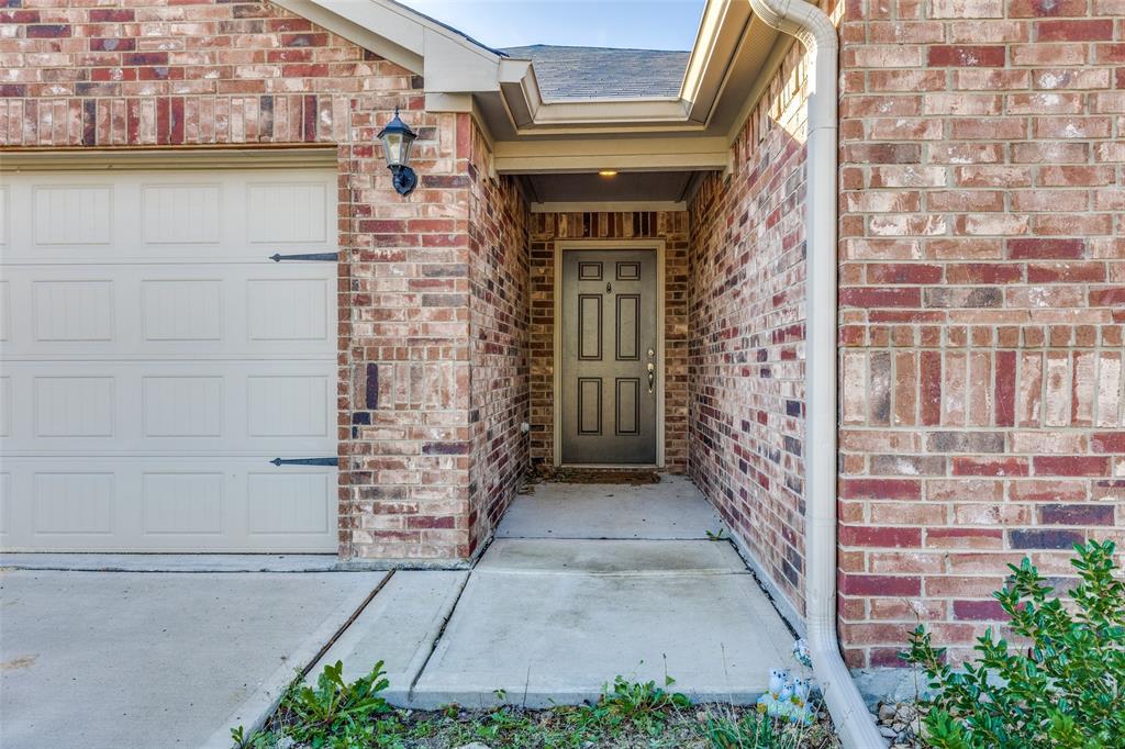 201 Cattlemans Crk Road Newark, TX 76071 - Photo 3 of 25 a view of front door of house with stairs