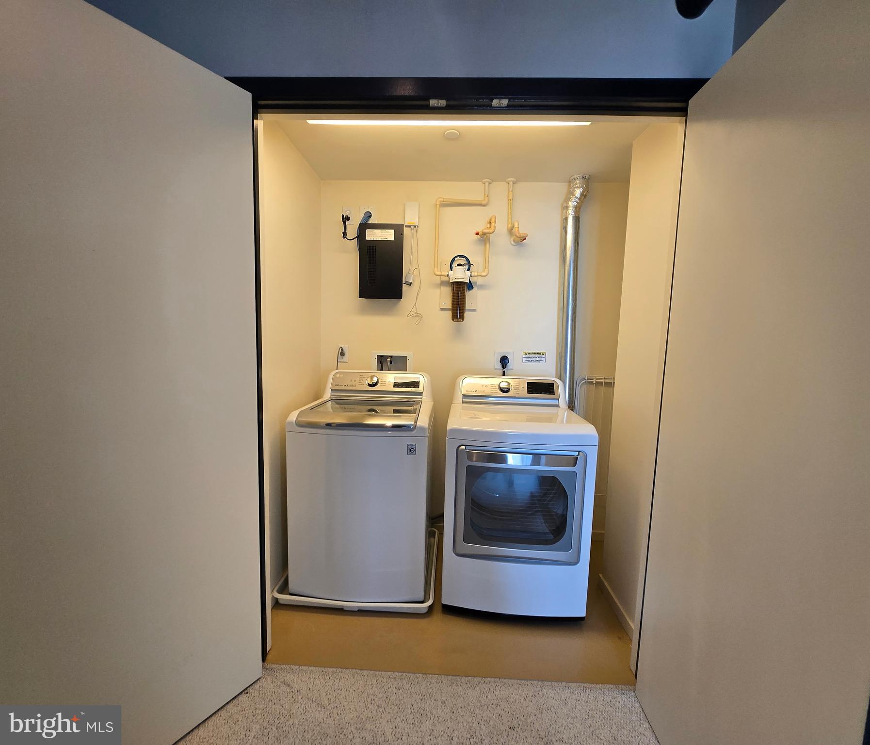 1200 Steuart Street, Unit 1913 Baltimore, MD 21230 - Photo 32 of 57 Convenient upper Laundry with full-size units.