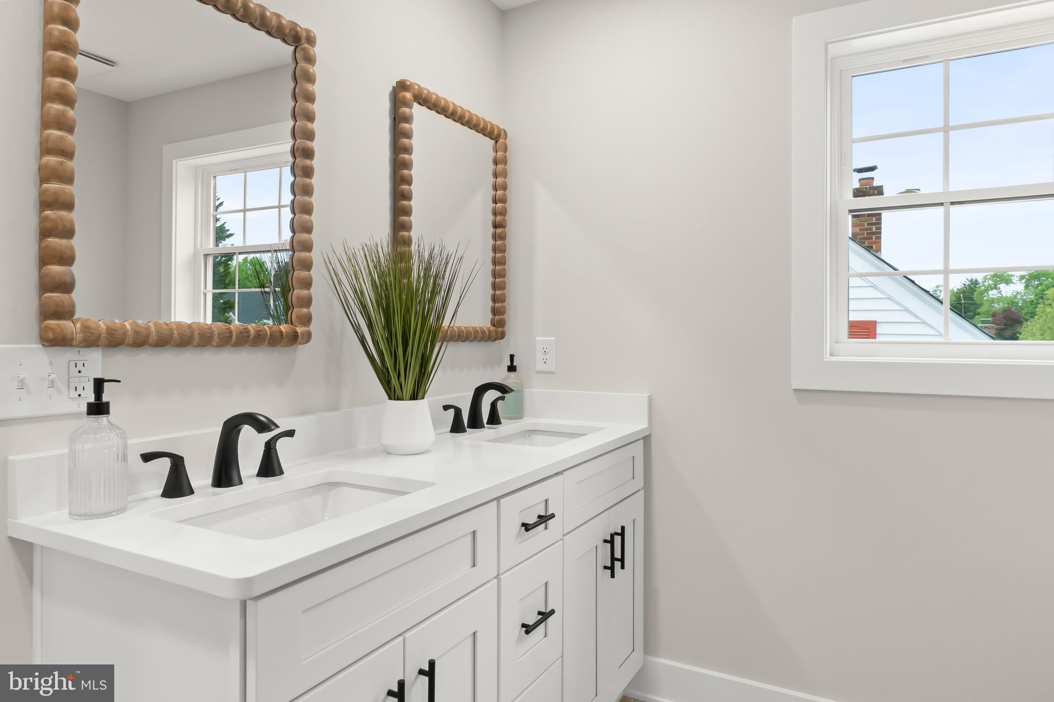 1505 Chestnut Avenue Haddon Heights, NJ 08035 - Photo 29 of 38 a bathroom with a sink and a mirror