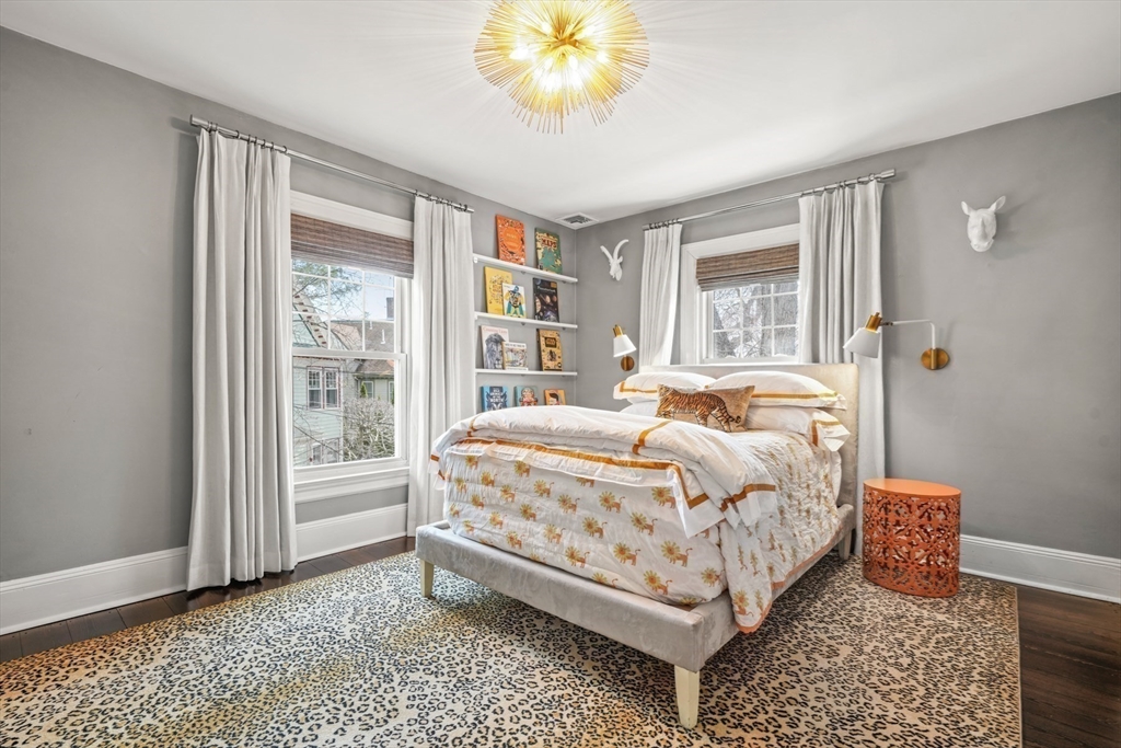 254 Commonwealth Avenue Newton, MA 02467 - Photo 20 of 37 a bedroom with a bed and a window