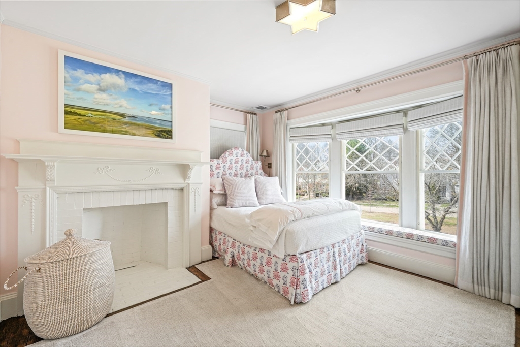 254 Commonwealth Avenue Newton, MA 02467 - Photo 21 of 37 a bedroom with a bed table and window