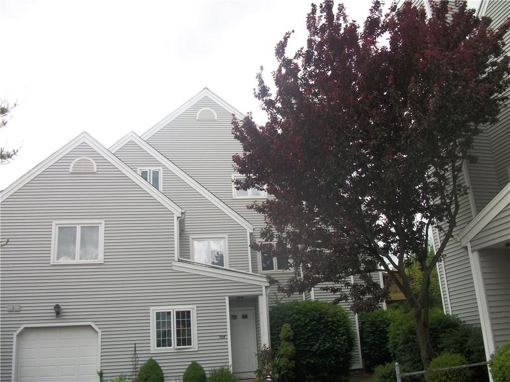 a view of a house with a tree