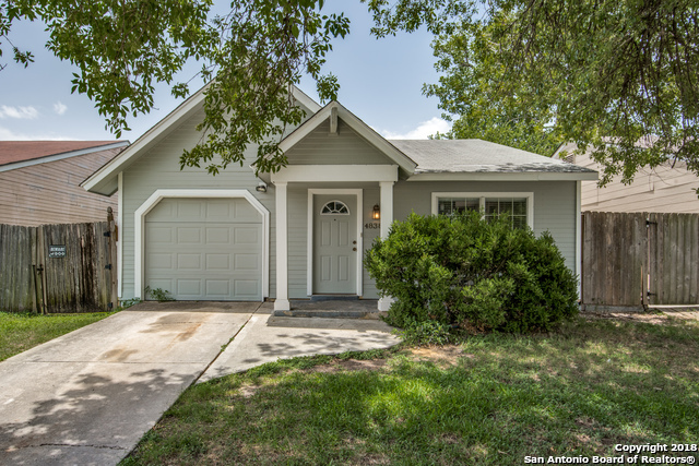 4838 Aspen Wood Kirby, TX 78219 - Photo 11 of 11 a front view of house with yard and trees