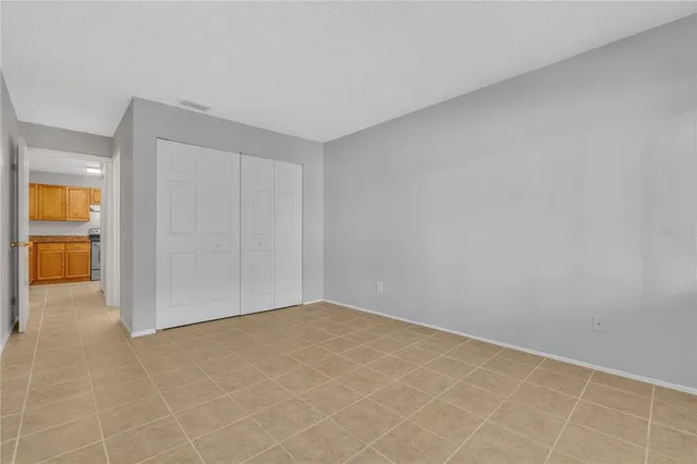 an empty room with a bathroom