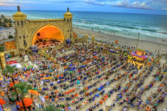 a view of an ocean and a yard