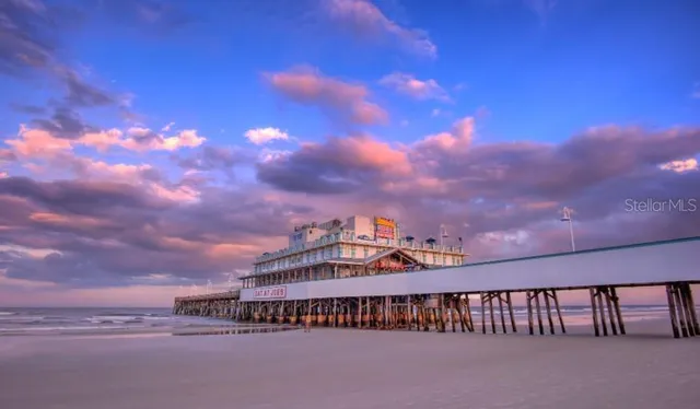 a view of parking area with a street