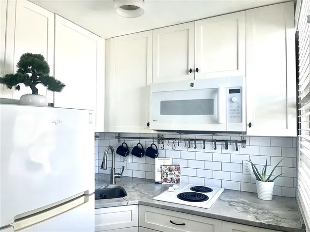 a bathroom with a sink and a shower