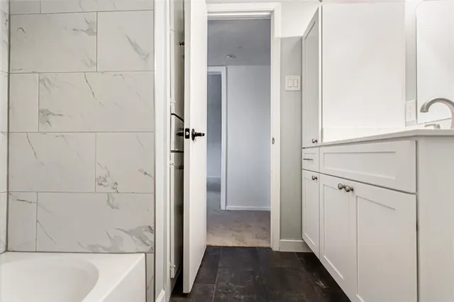 a bathroom with a bathtub