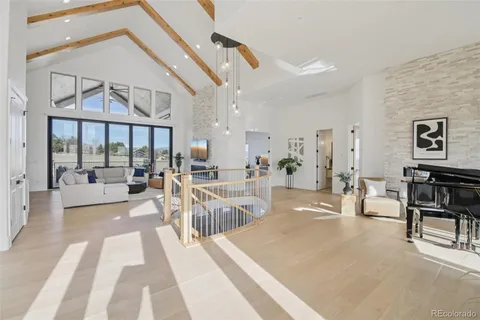 a view of a living room and dining room