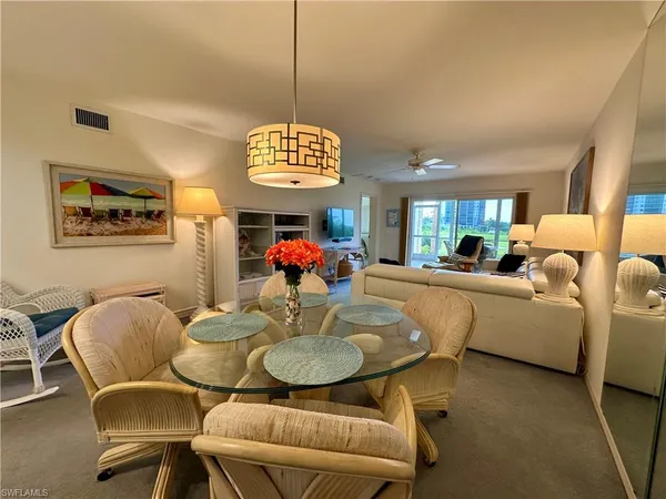 a view of a dining room with furniture