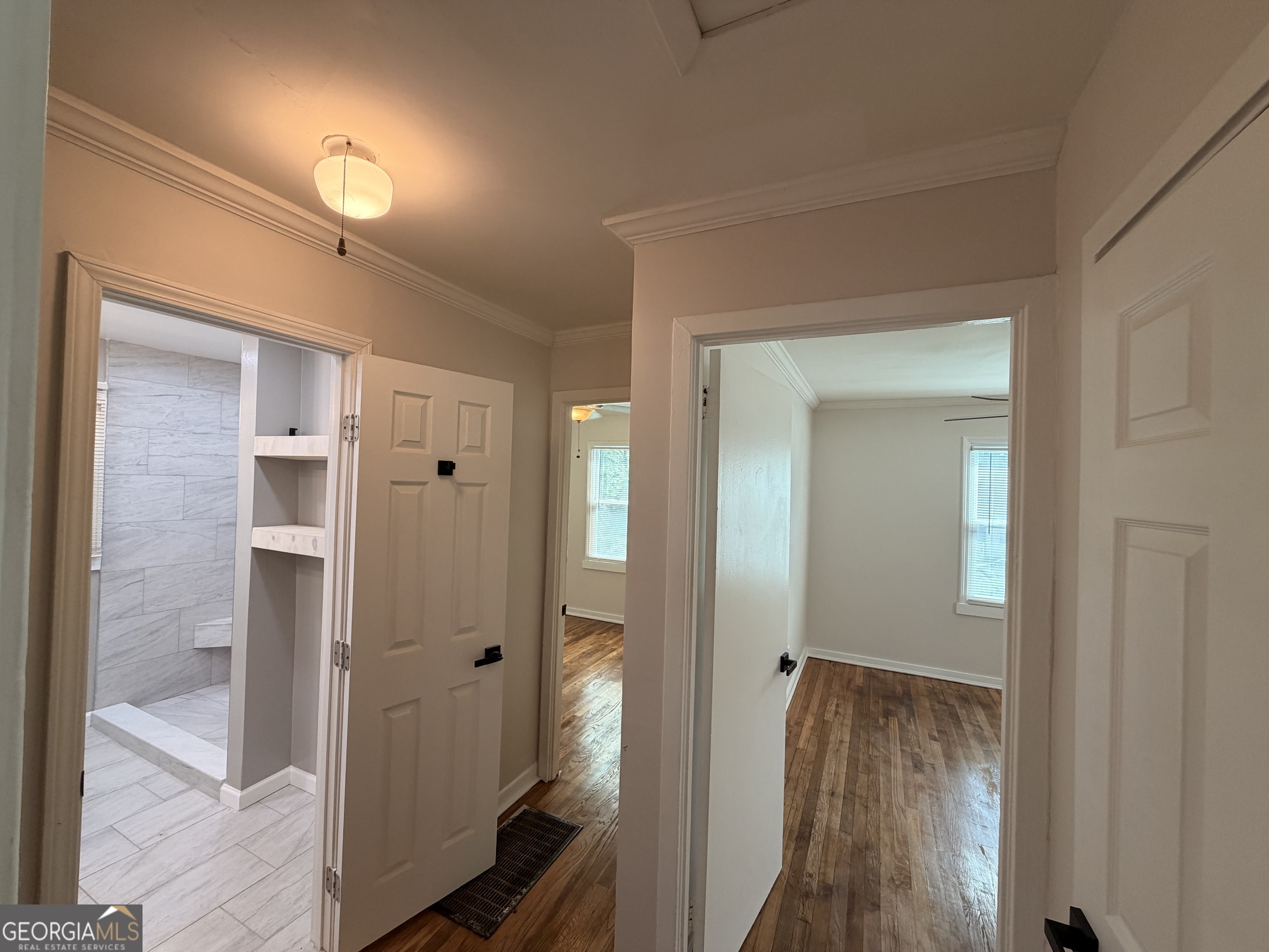 1734 Cahoon Street Southwest Atlanta, GA 30310 - Photo 16 of 29 a view of a bathroom from a hallway
