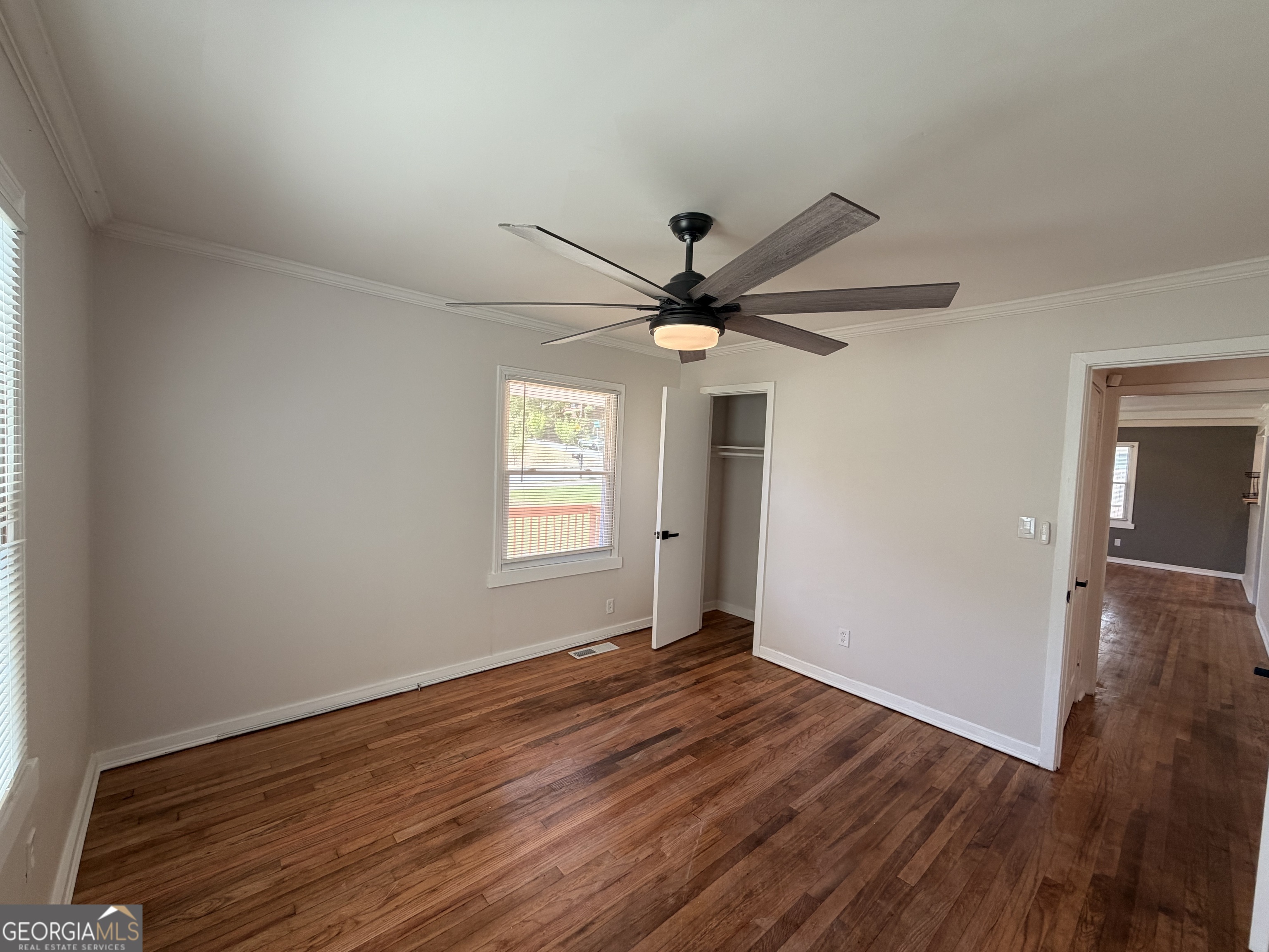 1734 Cahoon Street Southwest Atlanta, GA 30310 - Photo 18 of 29 a view of a big room with wooden floor and windows