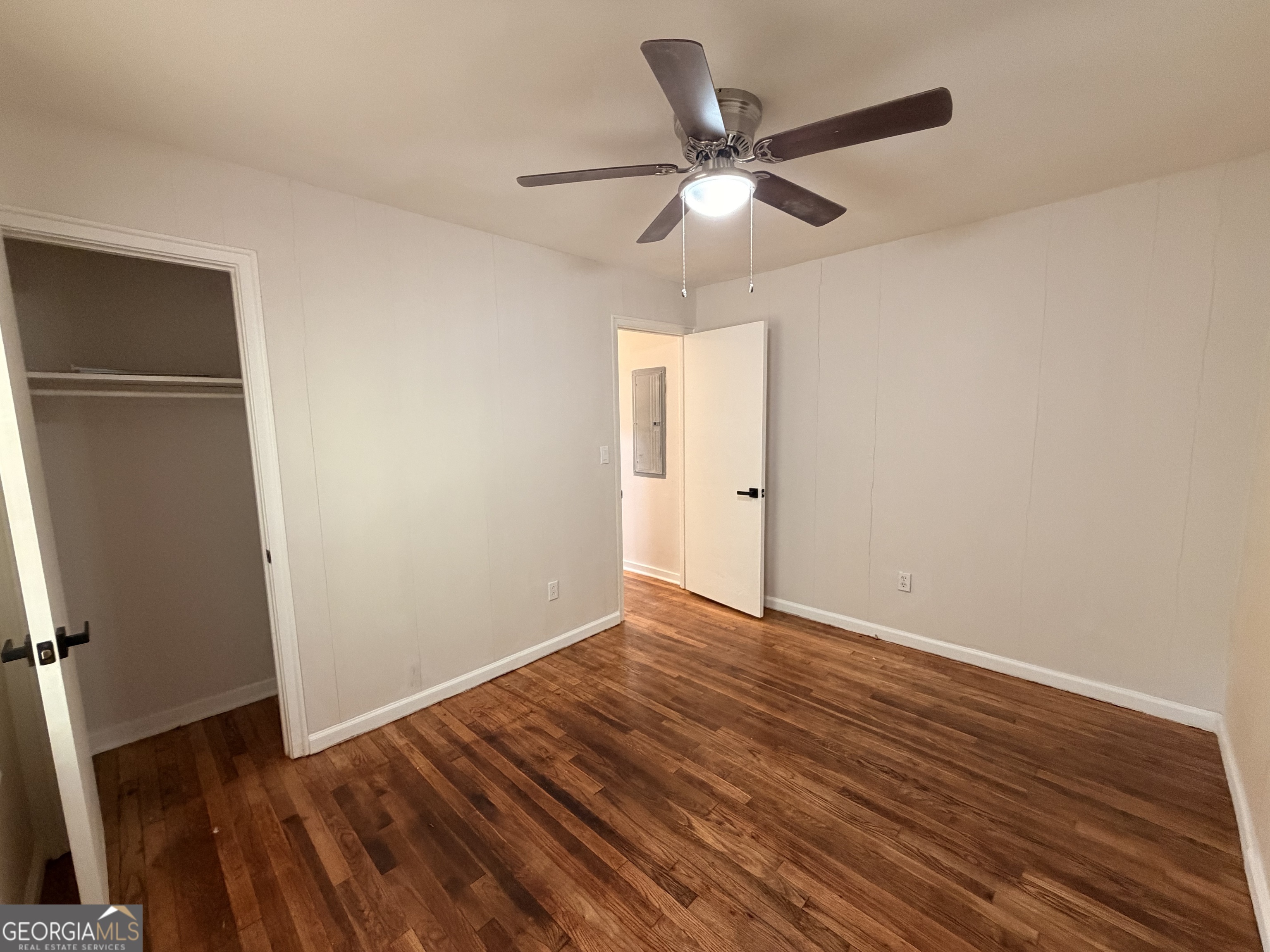 1734 Cahoon Street Southwest Atlanta, GA 30310 - Photo 24 of 29 a view of an empty room with wooden floor