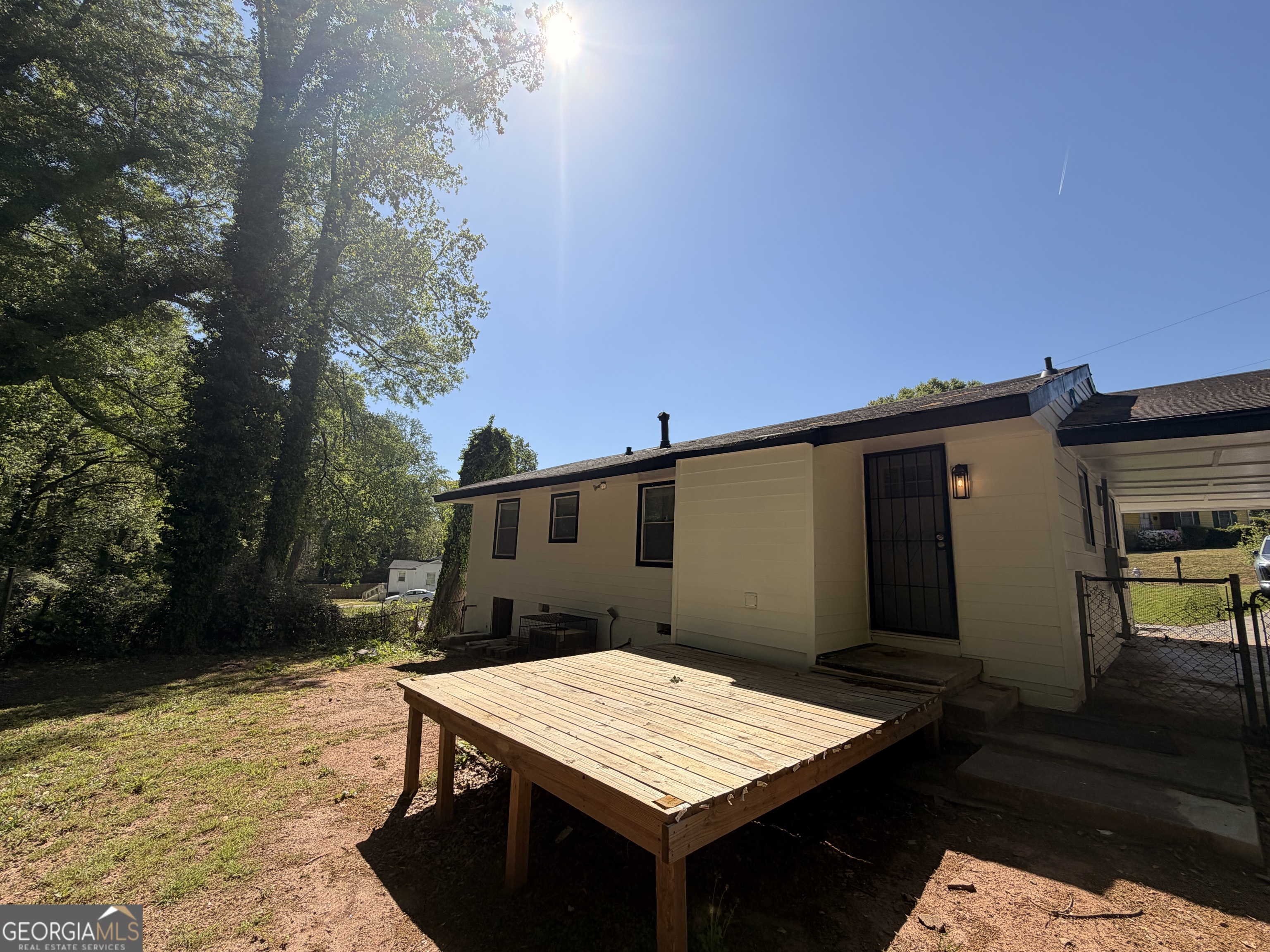 1734 Cahoon Street Southwest Atlanta, GA 30310 - Photo 6 of 29 a terrace of a house with table and chairs