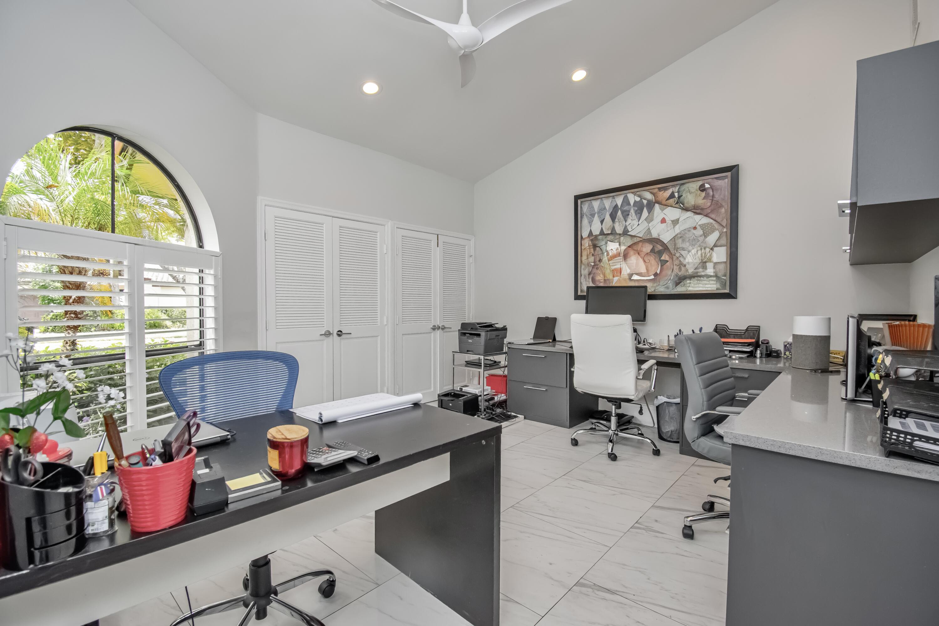 22504 Esplanada Circle Boca Raton, FL 33433 - Photo 25 of 47 a room with gym equipment and a large window