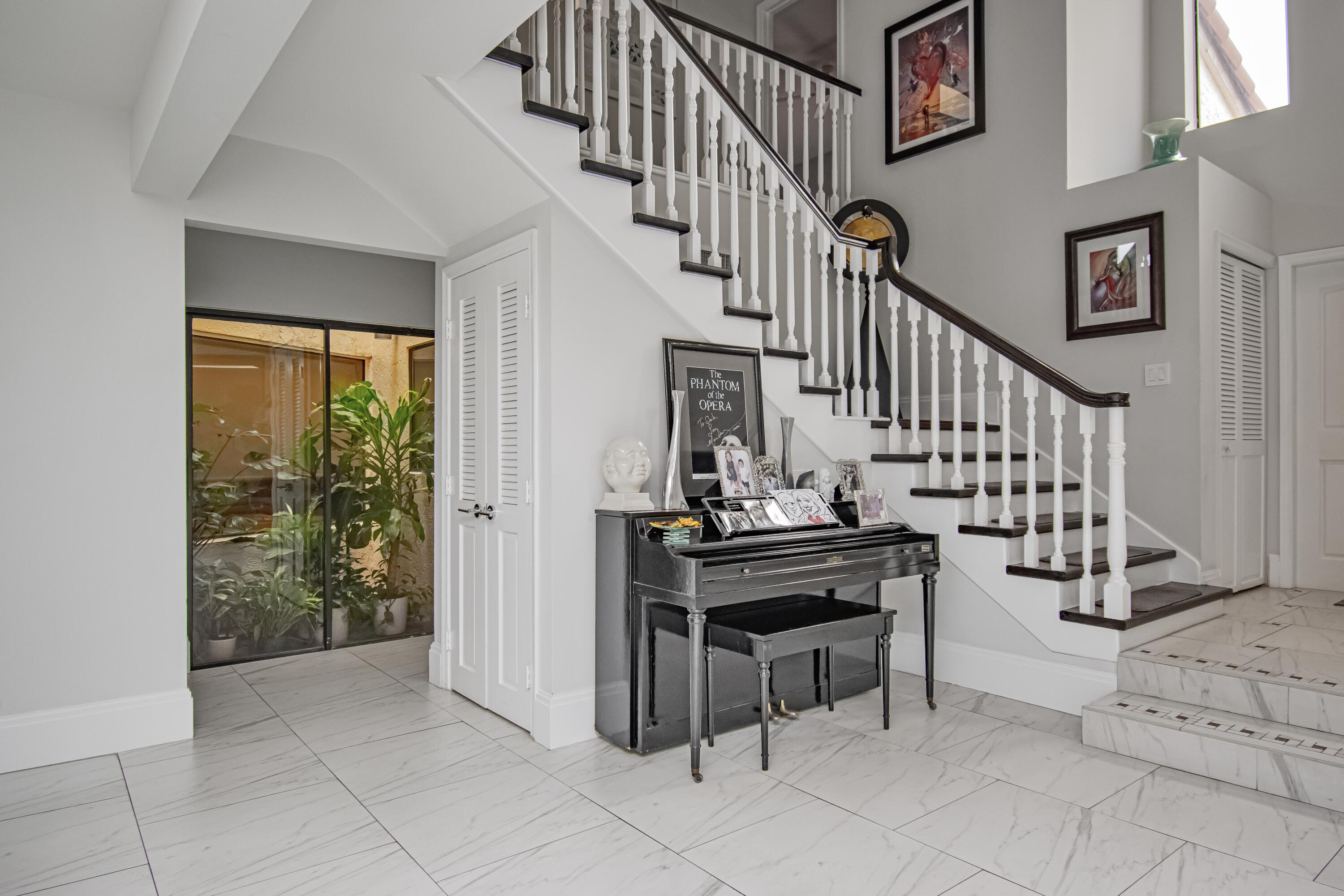 22504 Esplanada Circle Boca Raton, FL 33433 - Photo 9 of 47 a view of entryway and hall