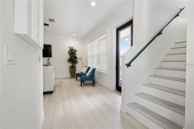 a view of entryway with livingroom and furniture