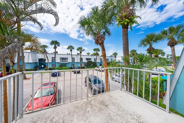 a view of a balcony with city view