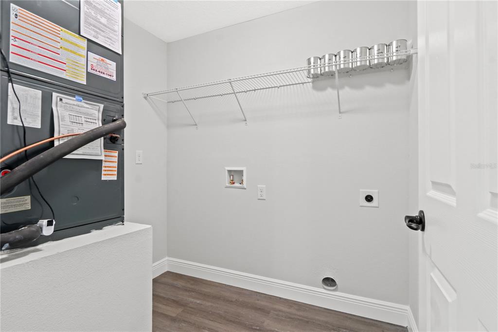 605 Abarth Avenue Sebring, FL 33872 - Photo 22 of 28 a bathroom with a shower and a sink