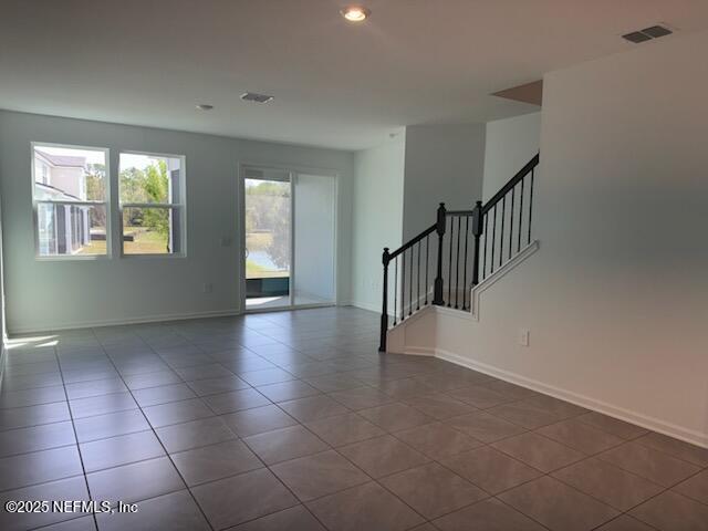 33 Summer Moon Drive St. Augustine, FL 32095 - Photo 3 of 41 a view of an empty room with glass door
