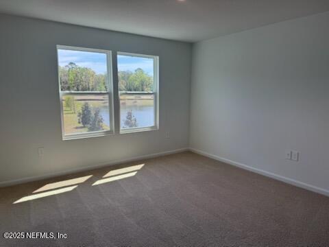 33 Summer Moon Drive St. Augustine, FL 32095 - Photo 4 of 41 an empty room with a window