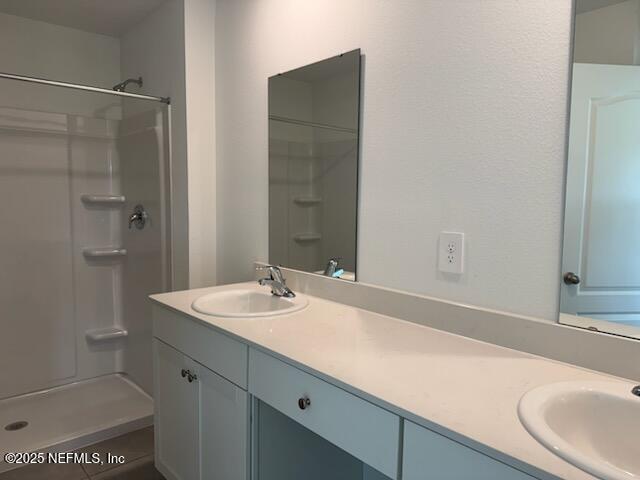 33 Summer Moon Drive St. Augustine, FL 32095 - Photo 5 of 41 a bathroom with a sink and a mirror