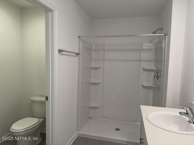 33 Summer Moon Drive St. Augustine, FL 32095 - Photo 6 of 41 a bathroom with a shower a toilet and a sink