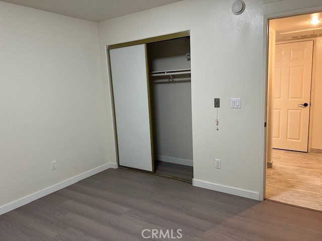 918 West Garvey Avenue, Unit 103 Monterey Park, CA 91754 - Photo 11 of 25 an empty room with closet and a window