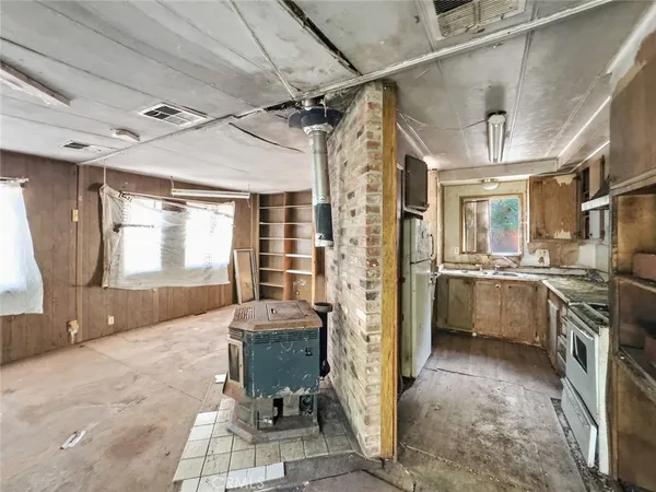 a kitchen with a stove and a sink