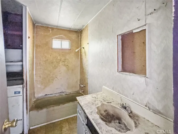 a kitchen with stainless steel appliances granite countertop a stove and a refrigerator