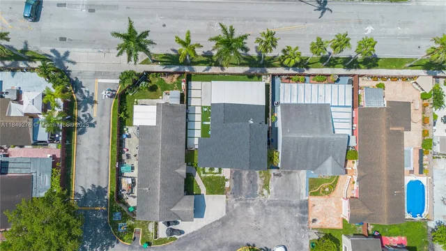 an aerial view of a house with a garden