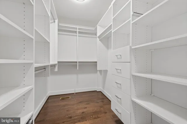 a view of an empty walk in closet
