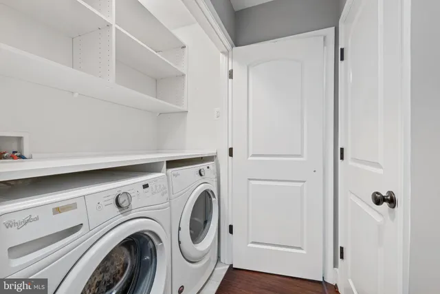 a view of washer and dryer in a utility room