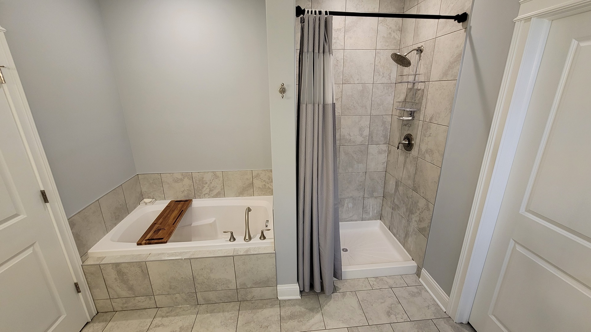 1919 Truman Street Sycamore, IL 60178 - Photo 22 of 50 a bathroom with a tub and shower