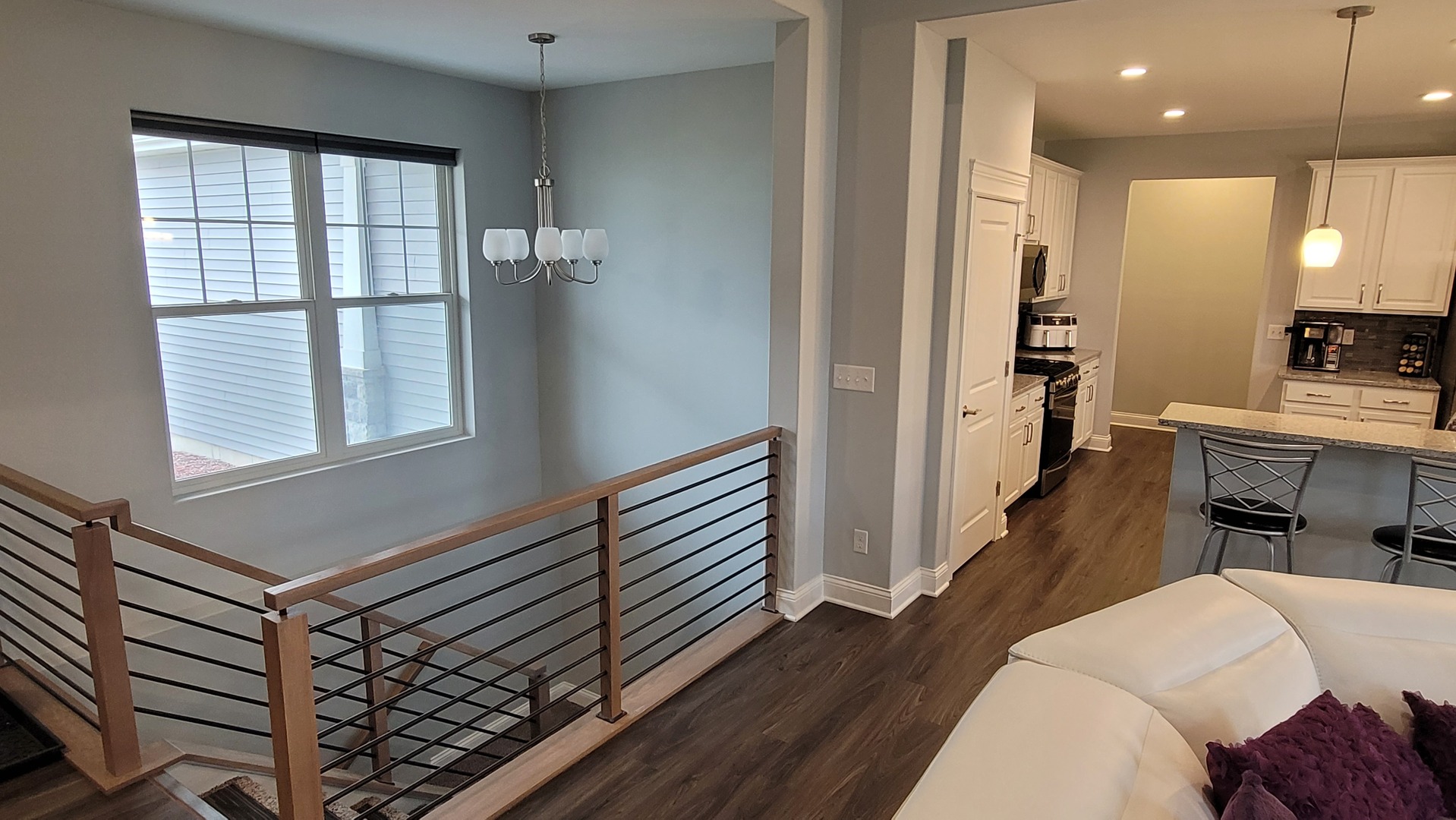 1919 Truman Street Sycamore, IL 60178 - Photo 32 of 50 a view of a hallway with furniture and a window