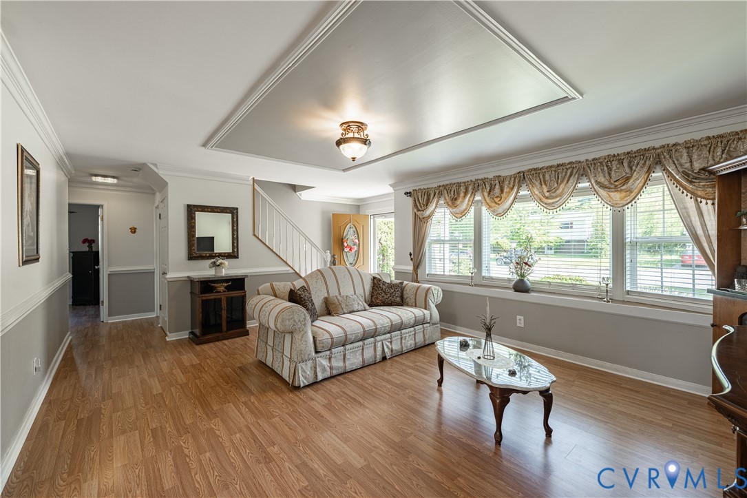 9217 Fisk Road Richmond, VA 23229 - Photo 8 of 39 a living room with furniture and a large window