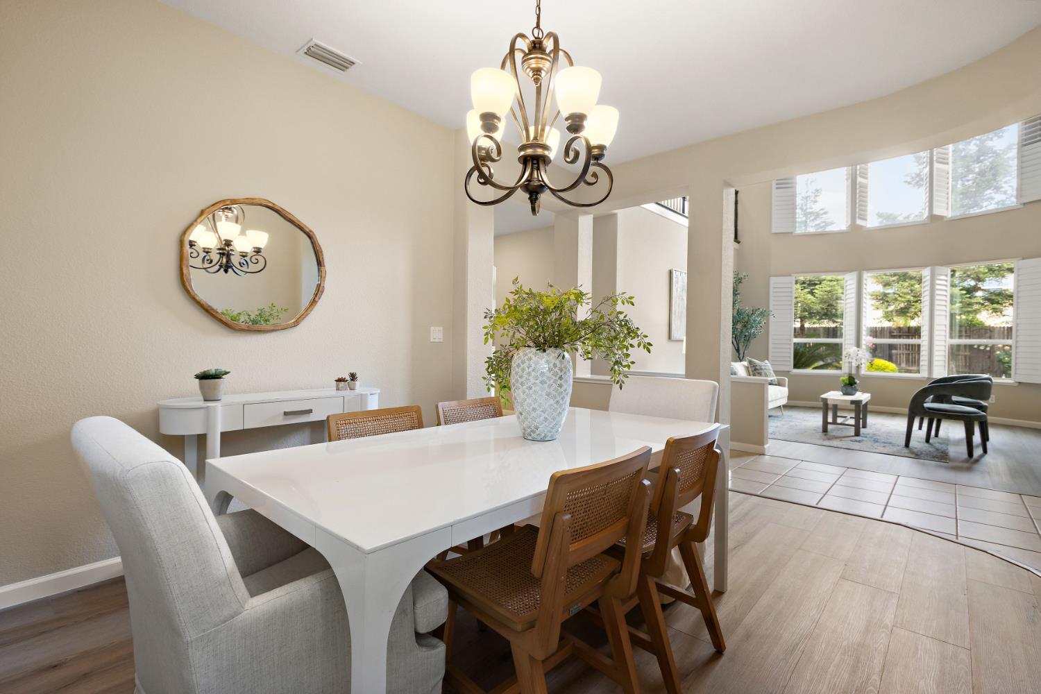 5631 Tufts Street Davis, CA 95618 - Photo 14 of 69 a view of a dining room with furniture wooden floor and chandelier
