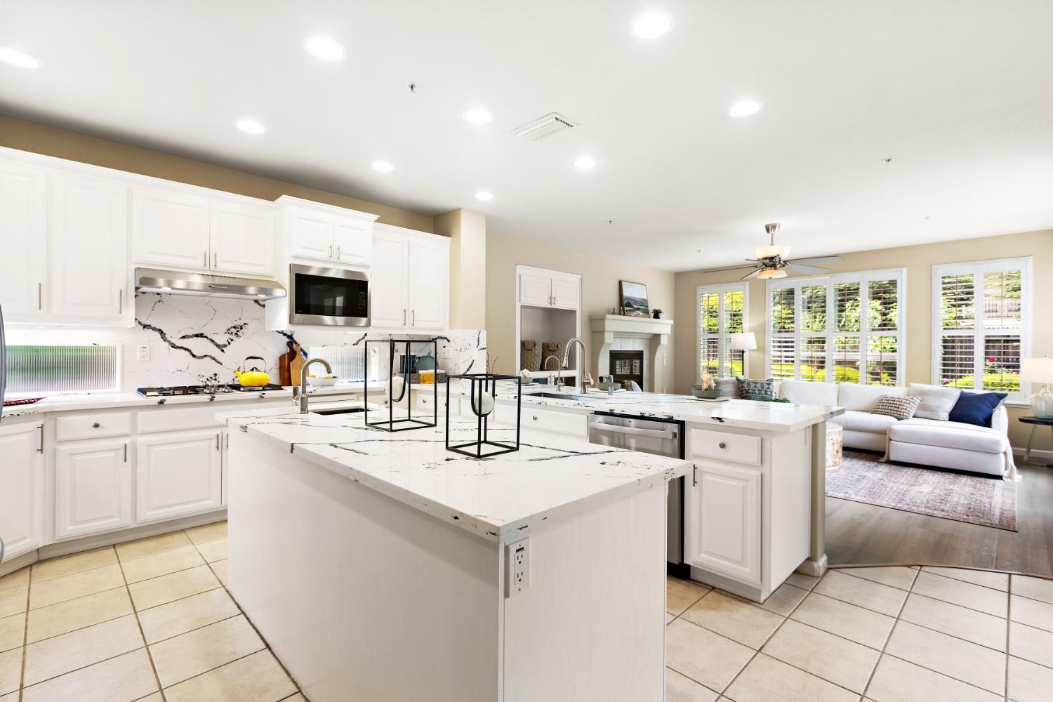 5631 Tufts Street Davis, CA 95618 - Photo 21 of 69 a kitchen with counter top space appliances and windows