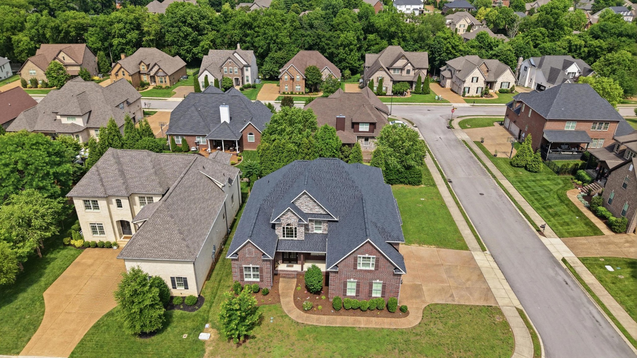 6000 Wallaby Court Spring Hill, TN 37174 - Photo 49 of 57 an aerial view of residential houses with outdoor space and parking
